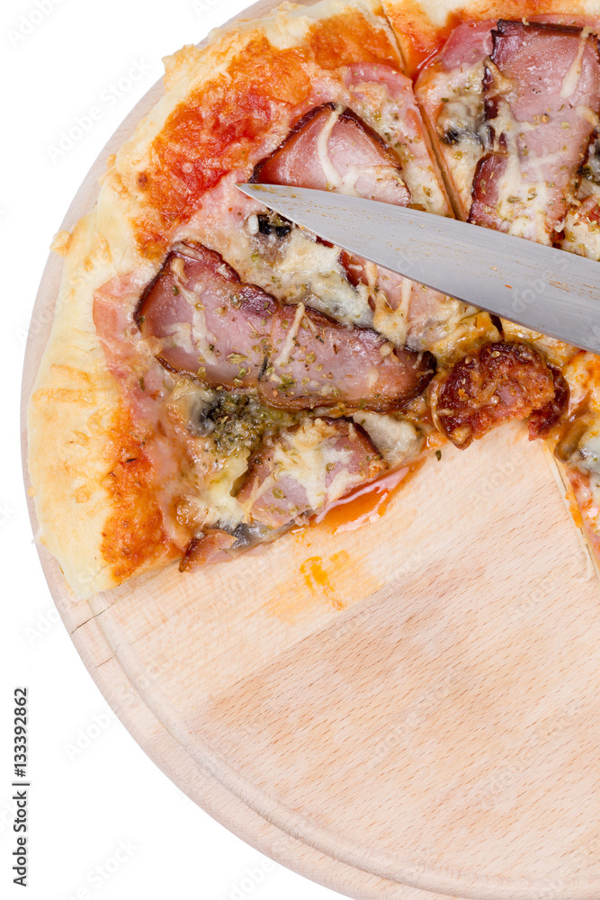 Flat lay overview of pizza with domestic ham sirloin and sausage Flat lay overview of pizza with domestic ham sirloin and sausage