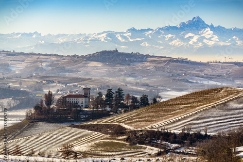 Castle and mount Viso in northern italy, langhe region, piedmont