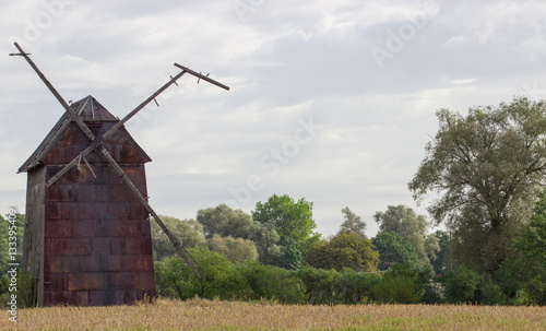 Kawnice, Poland. Old ruined windmill on the field.