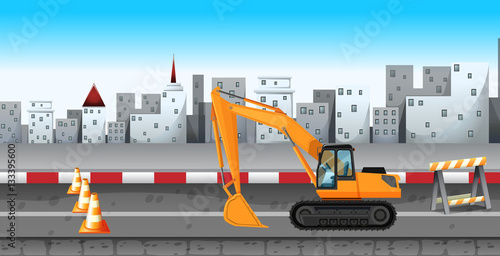 Excavator working at the road construction