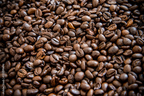 Roasted coffee beans background © pom669
