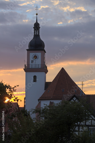 Catholic parish church St. Johann Baptist in Hilpoltstein, Germany in evening light