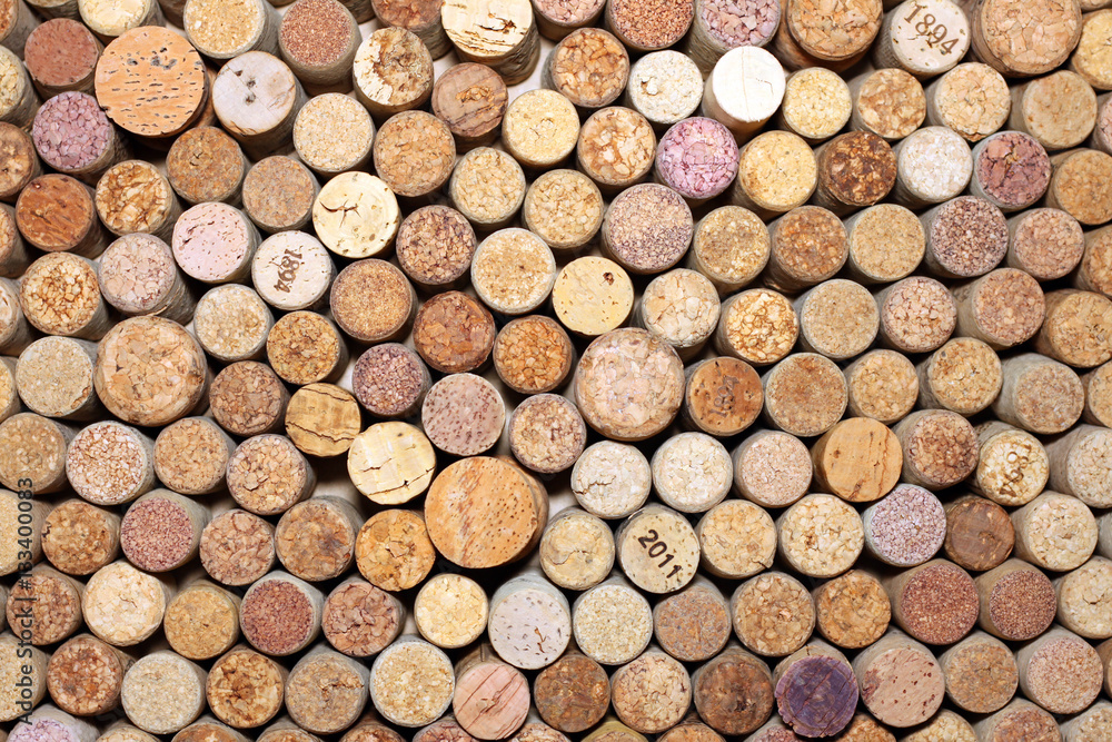 Background of used wine corks. Wall of many different wine corks. Closeup of wine corks. Background of used wine corks. Wall of many different wine corks. Closeup of wine corks.