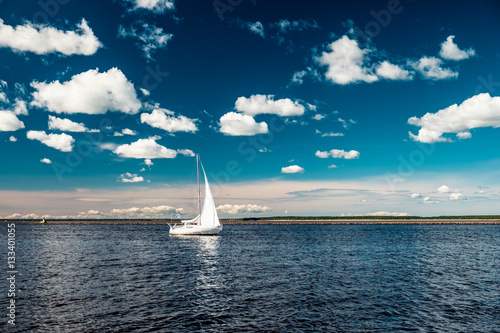 white sail white clouds