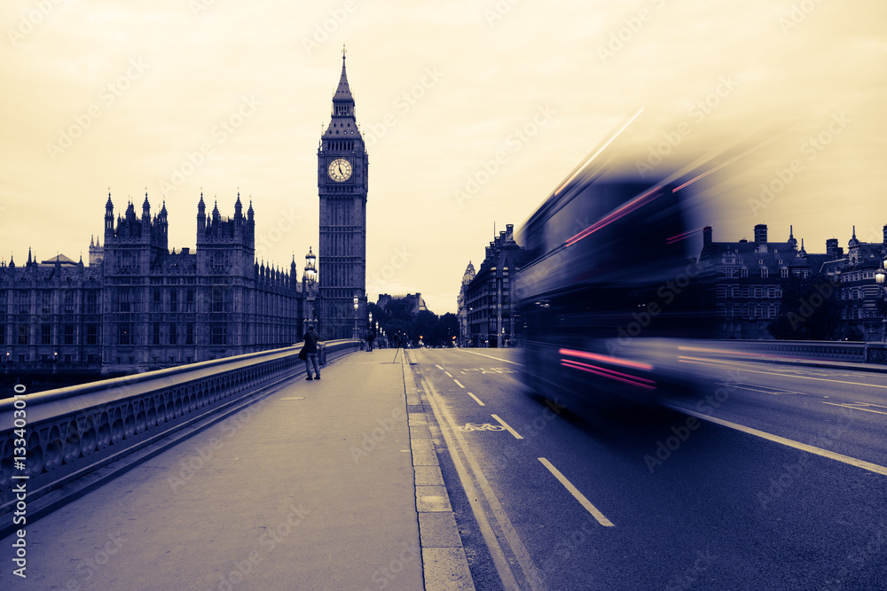 Big Ben and Blurred Bus in London.