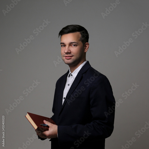 Handsome young teacher on g...