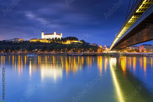 Bratislava castle Parliament and the New bridge over Danube river with evening lights in capital city of Slovakia Bratislava