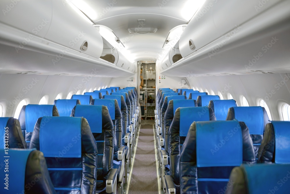 Angle shot of an airplane corridor Angle shot of an airplane corridor