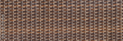 horizontal woven rattan texture for pattern and background photo