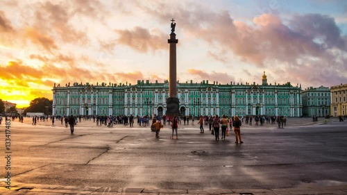 St Petersburg, Russia time-lapse at sunset. Palace square in Saint Petersburg, Russia during the evening with cloudy sky