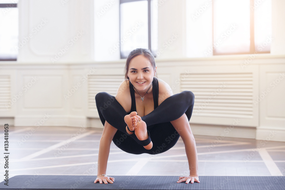 Young asian woman doing yoga pose and asana. Fitness girl enjoying yoga ...