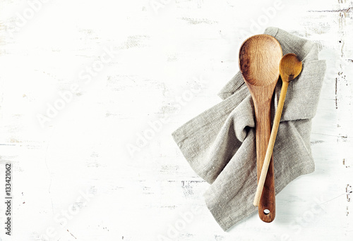 Two wooden spoons on a linen towel

 photo