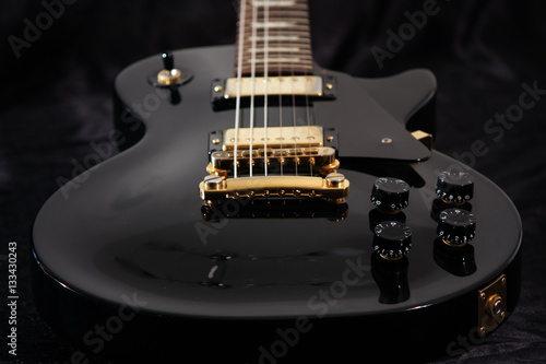 Close up of electric guitar photo