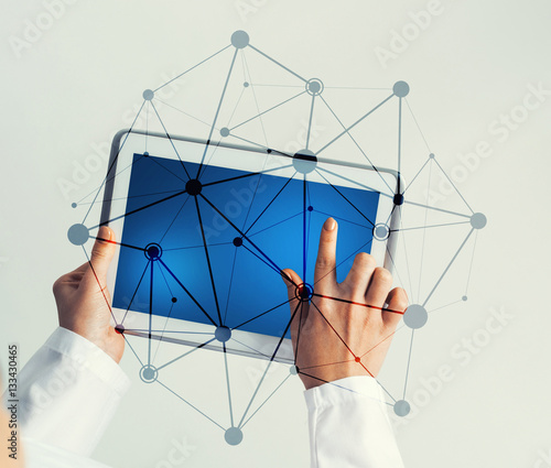 Close of female doctor hands working with tablet pc computer