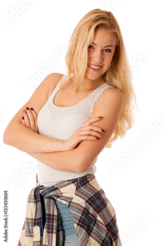 Cute blonde woman in free style dress jeans and shirt isolated o