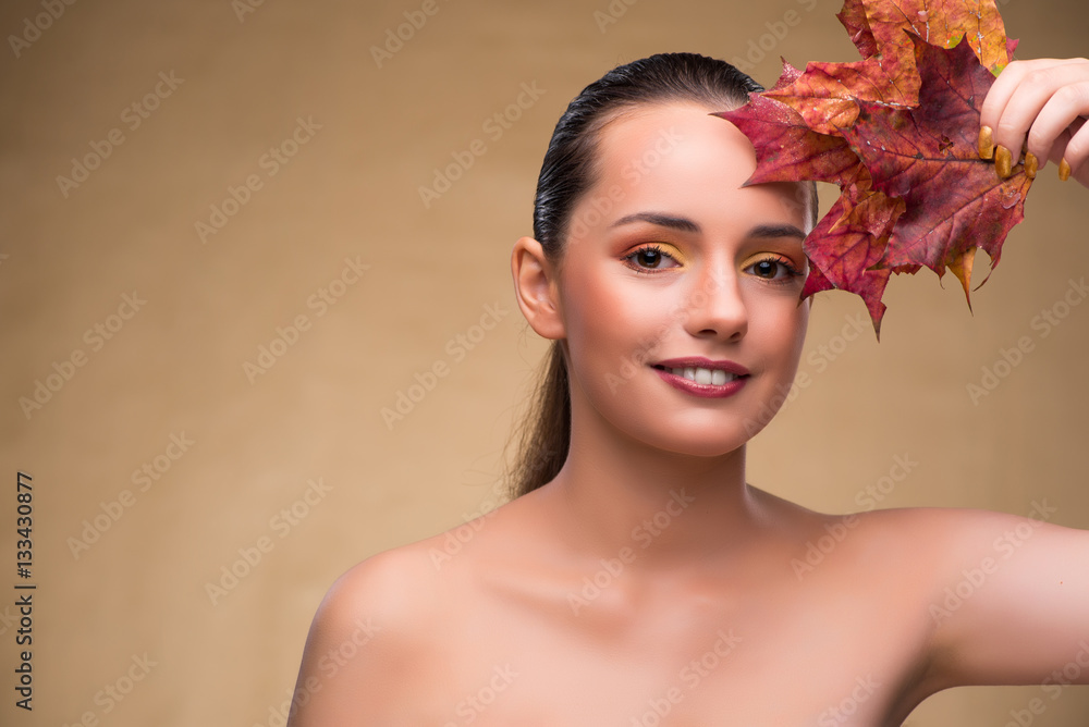 Beautiful woman in with autumn dry leaves Beautiful woman in with autumn dry leaves