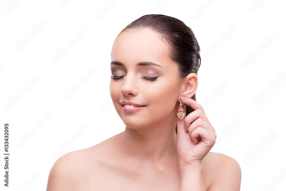 Young woman showing off jewellery isolated on white Young woman showing off jewellery isolated on white