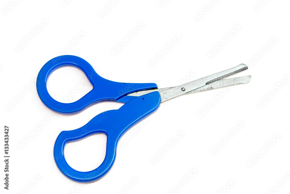 Open blue baby scissors on a white background Open blue baby scissors on a white background