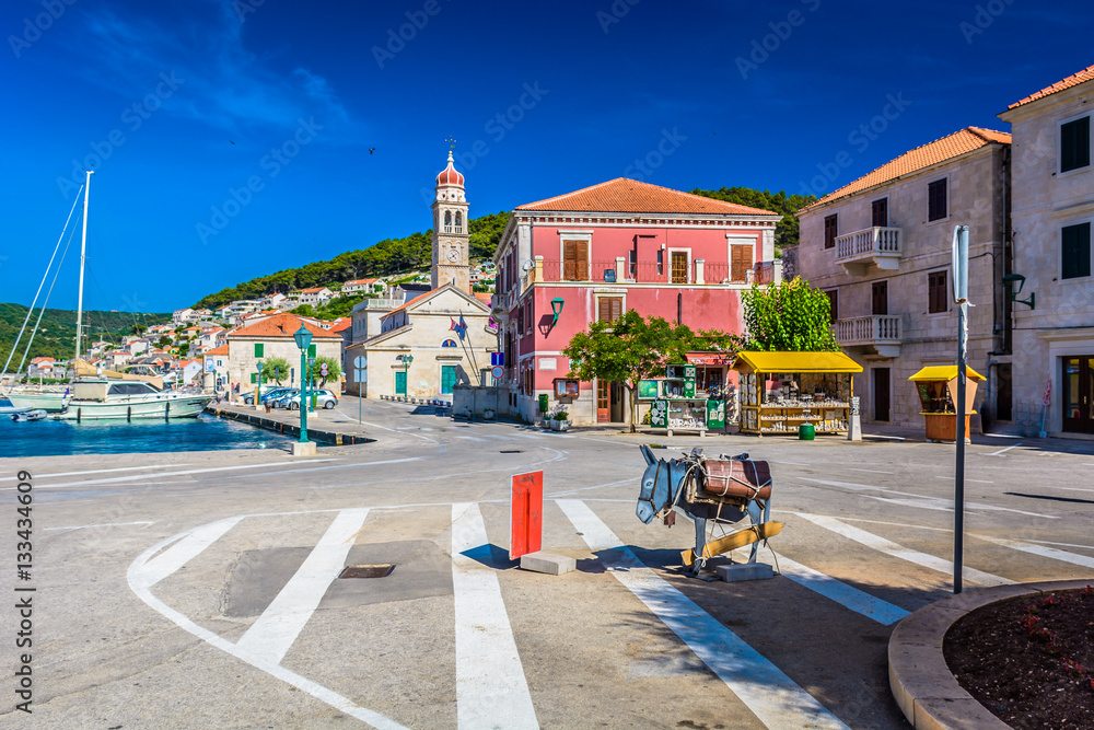 Adriatic place town Pucisca. / View at summer scenery in old Adriatic place Pucisca, Island Brac, croatian travel places. 
