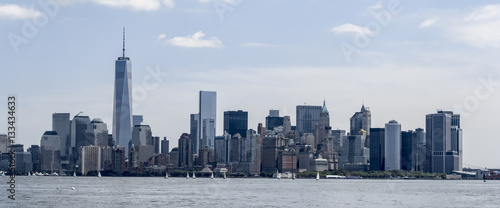 Panorama fo New York City skyline with Freedom Tower and sailboats seen from Hudson River