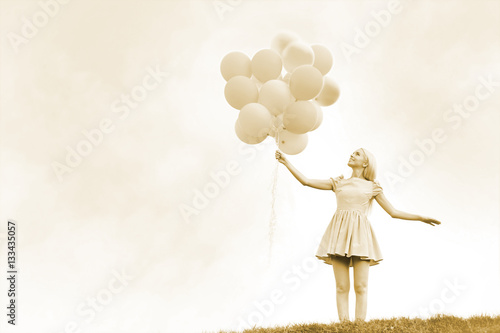 Young woman with colorful b...