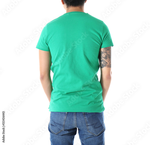 Young man in blank green t-...