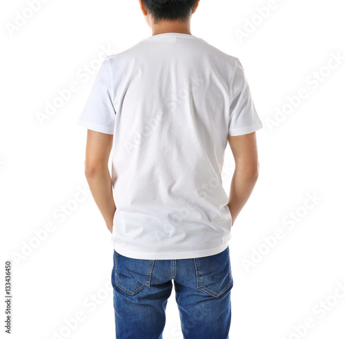 Young man in blank t-shirt on white background, close up