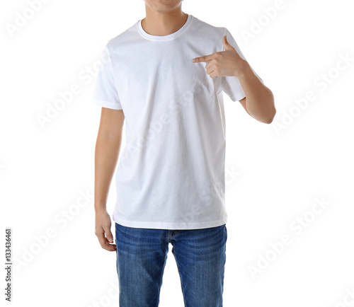 Young man in blank t-shirt on white background, close up