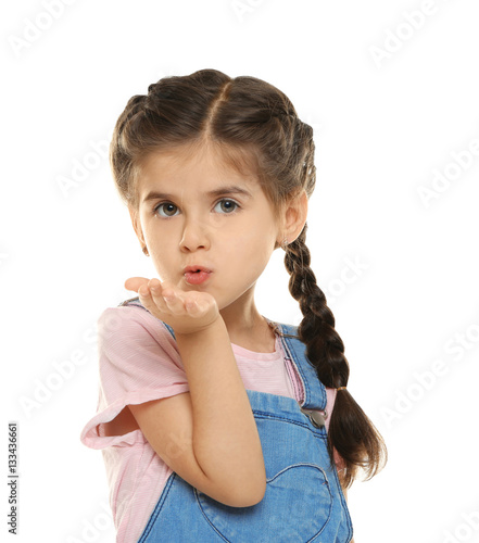 Cute little girl on white b...