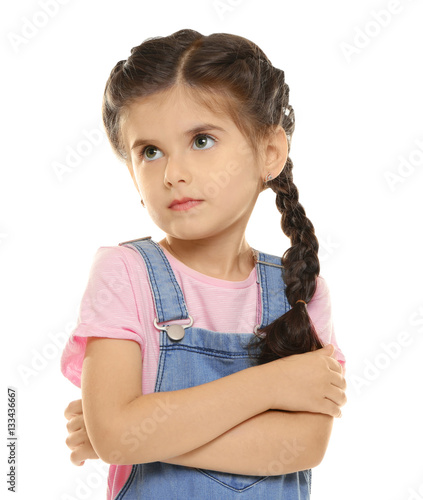 Cute little girl on white b...