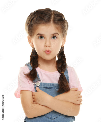Cute little girl on white b...