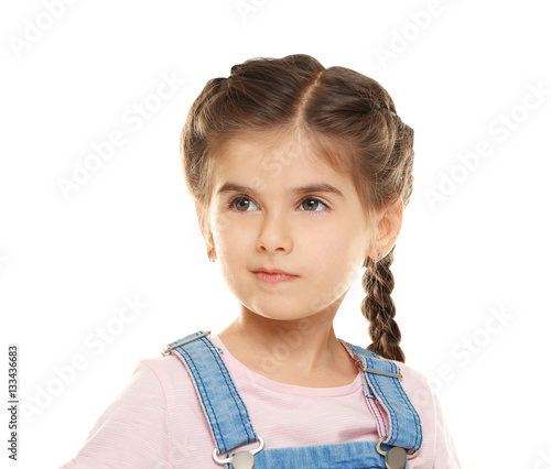 Cute little girl on white b...