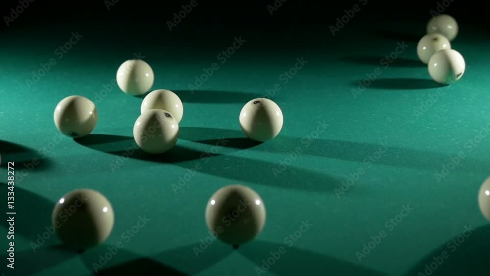 Russian billiards, the first blow, breaking the pyramid. Slow motion Russian billiards, the first blow, breaking the pyramid. Slow motion