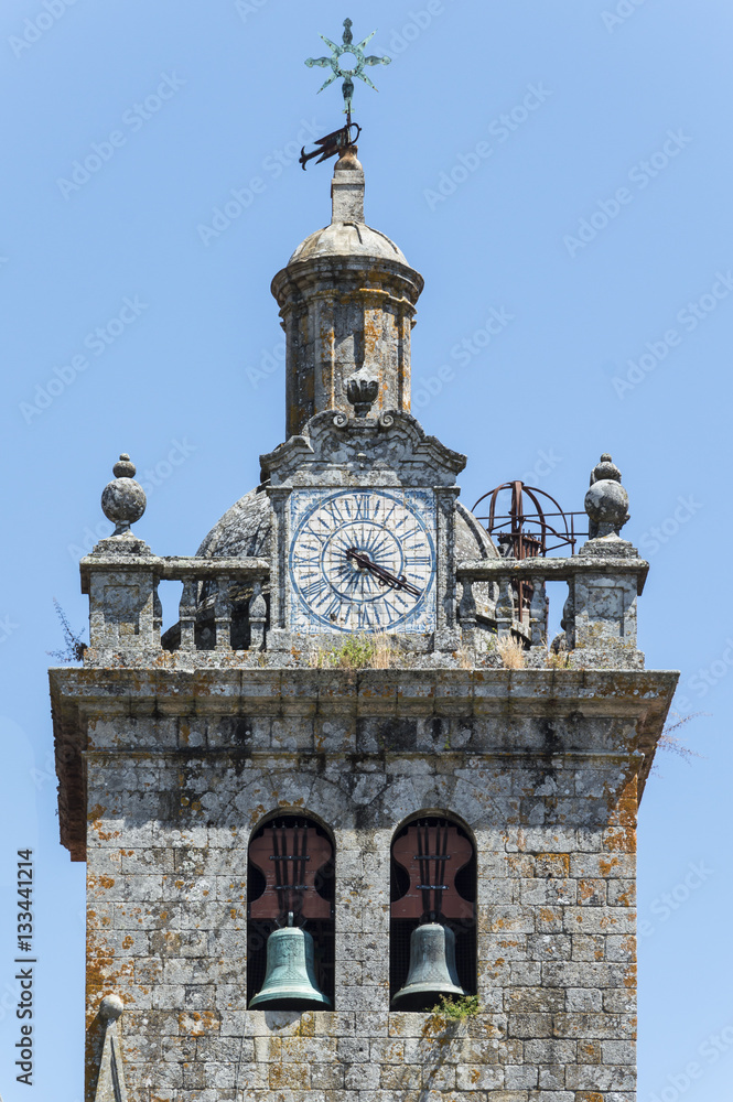 Steeple detail with clock in Viseu, Portugal