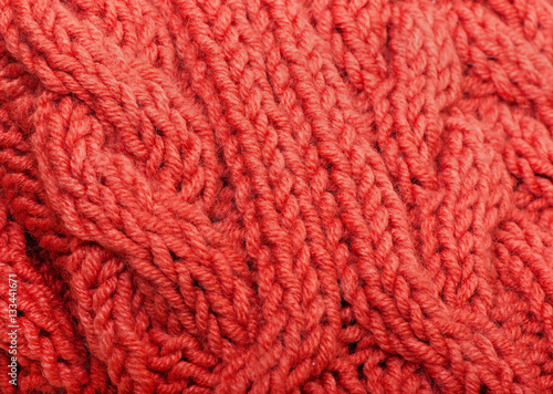 Background of red knitted fabric.