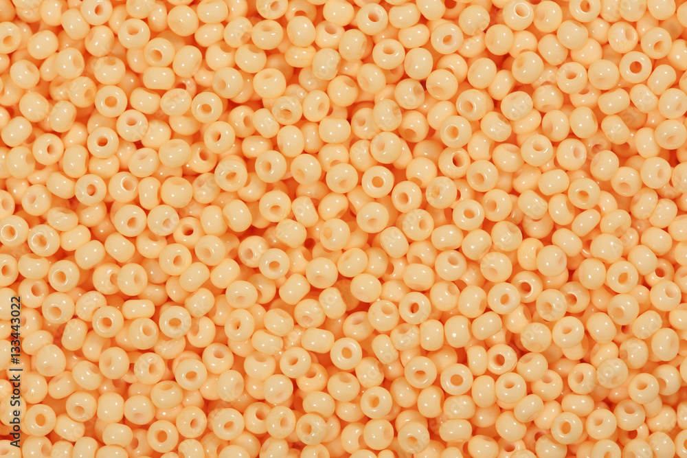 Dark orange seed beads.