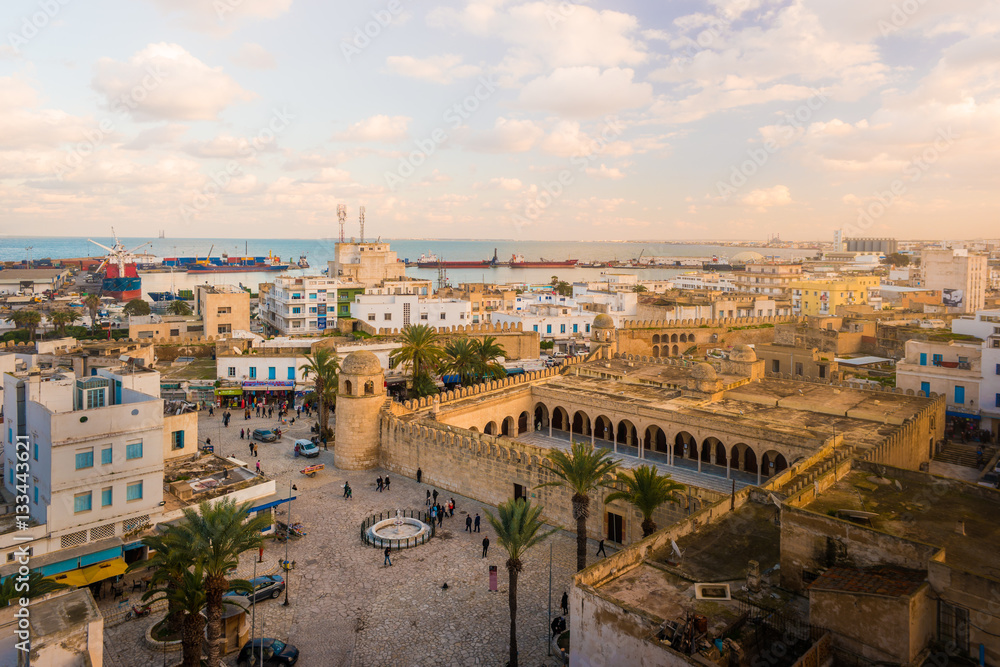 Beautiful sunset in Sousse, Tunisia. Cityscape with the view on Mosque and port of Sousse.