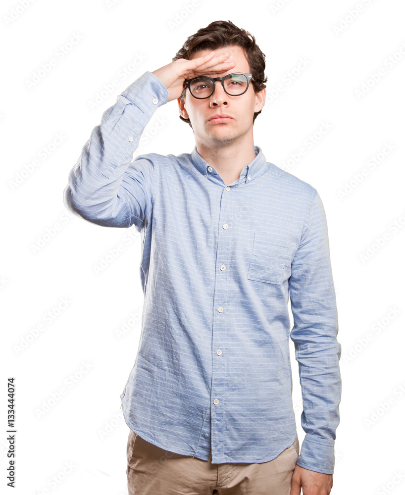 Concentrated young man looking at the horizon Concentrated young man looking at the horizon