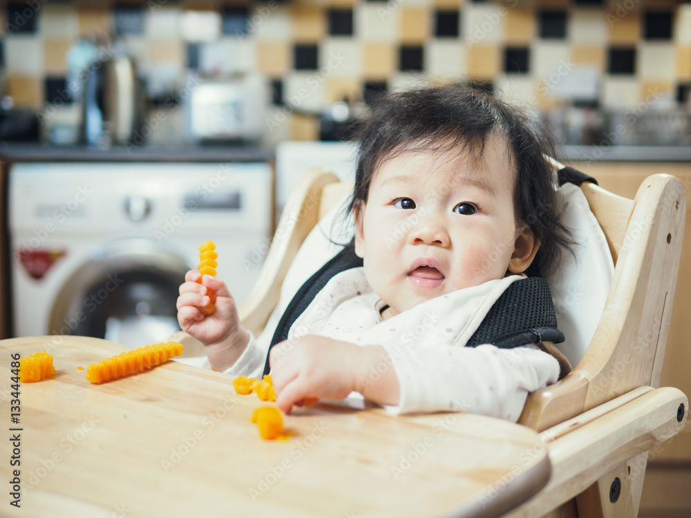 baby girl eating freshness butternut squash pasta first time at baby girl eating freshness butternut squash pasta first time at