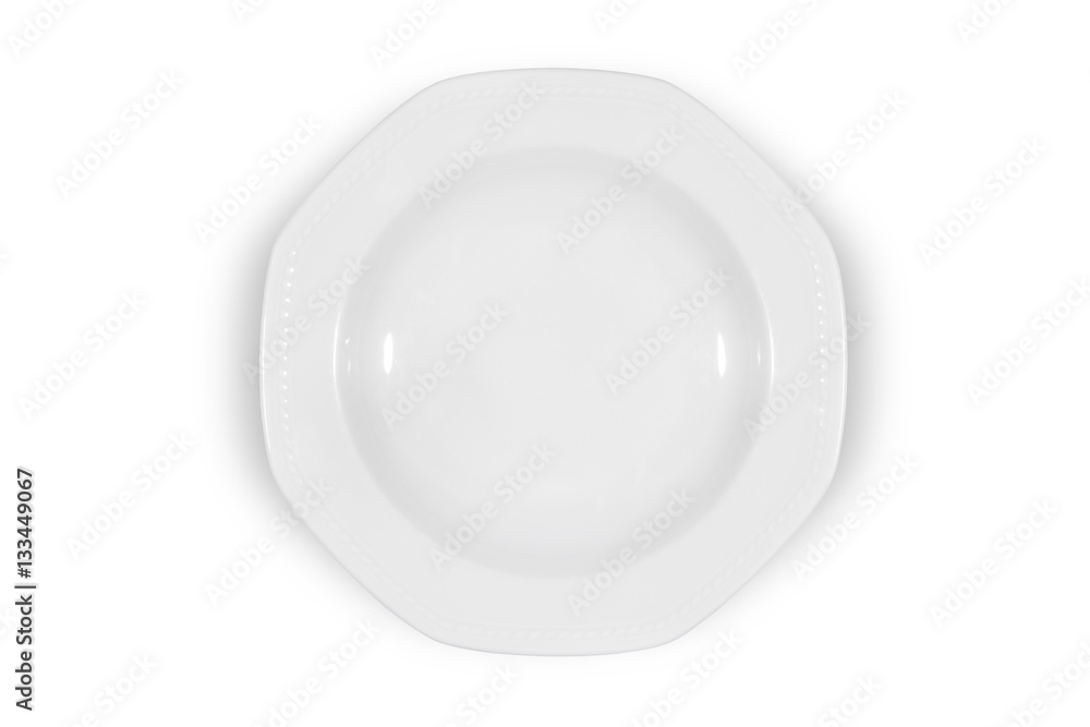 Soup deep white plate with wide shoulders and embellishment on white background from above Soup deep white plate with wide shoulders and embellishment on white background from above
