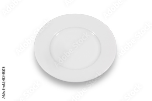 Flat white shallow porcelain plate with wide shoulders on white background from high angle