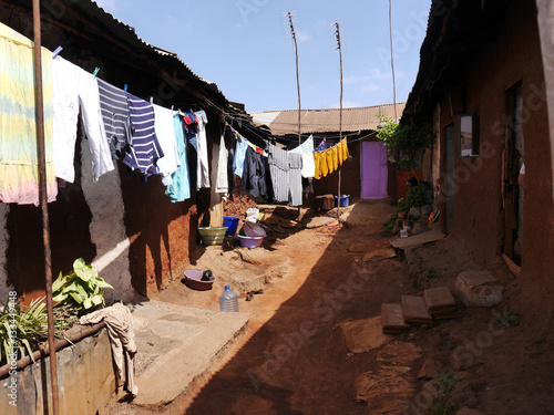 African slum - backyard in Kibera, Nairobi photo