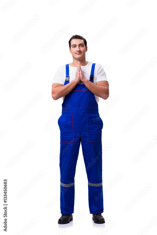 Handsome repairman wearing blue coveralls on white Handsome repairman wearing blue coveralls on white