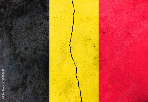 A crack in the wall. Flag of Belgium