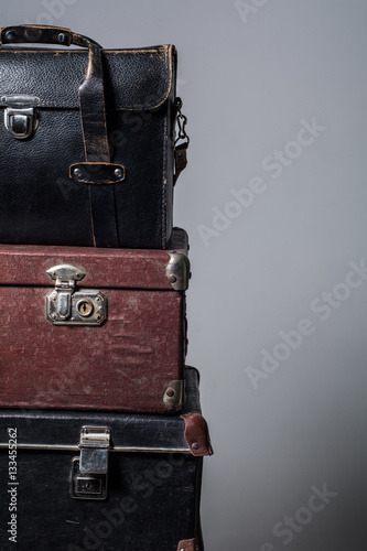 Background stack of old suitcases
