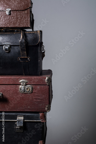 Background stack of old suitcases