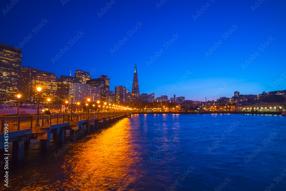 San Francisco cityscape at night from Pier 7.  Night sky and city lights.