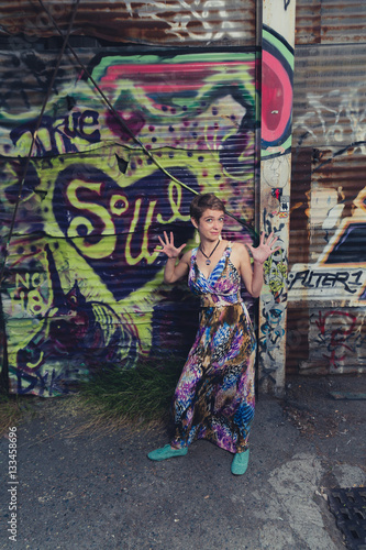 Young Caucasian woman dressed in bohemian style in an urban location