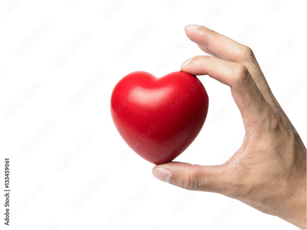 Red heart ball isolate on white background in hand