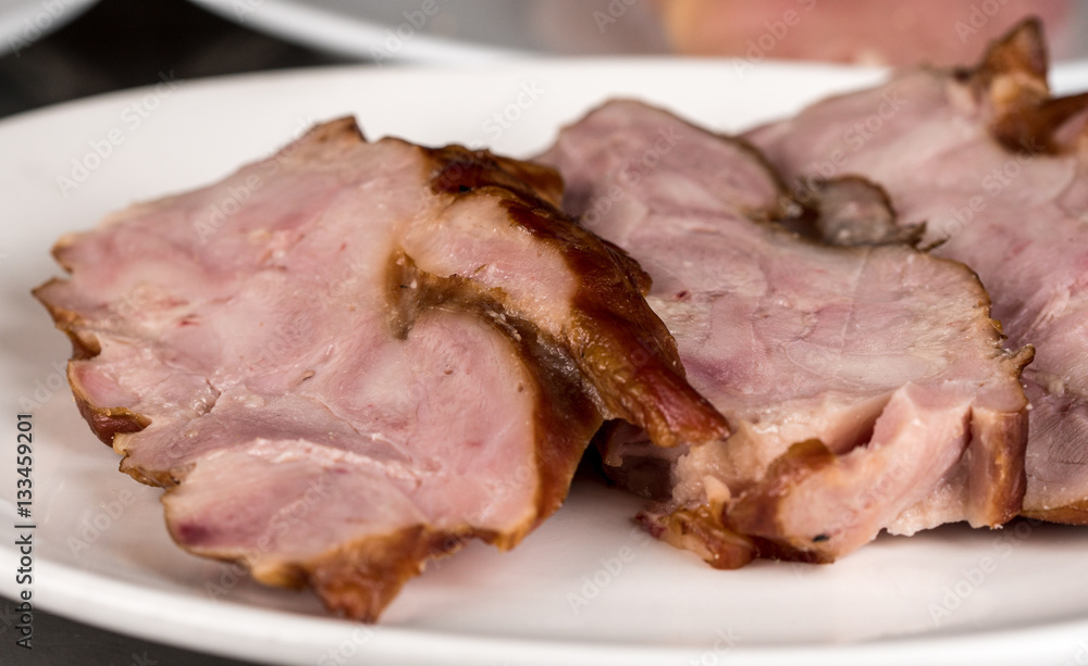 Smoked raw chicken meat, steak-like slices ready to go onto the grill Smoked raw chicken meat, steak-like slices ready to go onto the grill